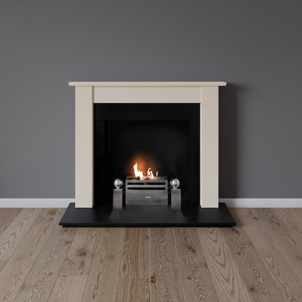 Bow fireplace in limestone with contemporary gas fire