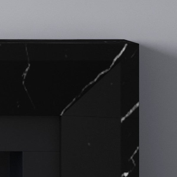 Detail of Clerkenwall fireplace in black marble