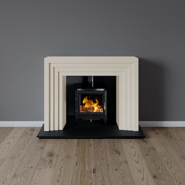 Hackney fireplace in limestone with wood burning stove