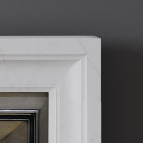 Detail of Limehouse fireplace in white marble